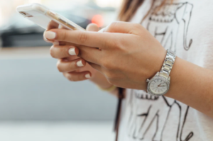 holding her phone